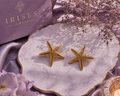 Golden Starfish Statement Stud Earrings featuring a textured ocean-inspired gold-tone finish.