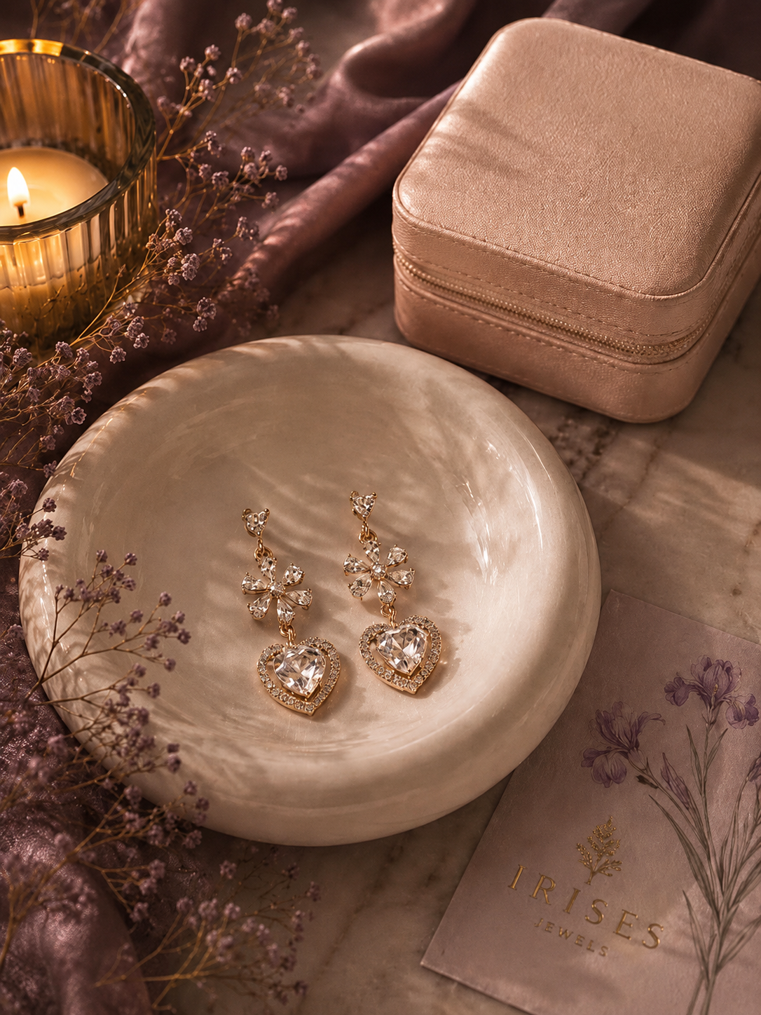 Crystal Blossom Heart Drop Earrings featuring sparkling floral crystal clusters with heart-cut crystal drops in a luxurious gold-tone finish.
